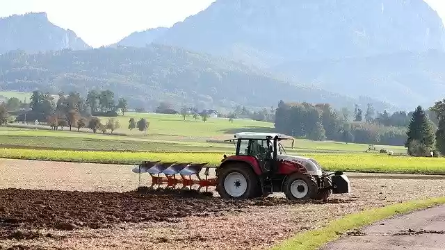 Free download Tractor Plough Agriculture Arable -  free photo or picture to be edited with GIMP online image editor