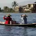 Two people rowing a boat by the river  screen for extension Chrome web store in OffiDocs Chromium
