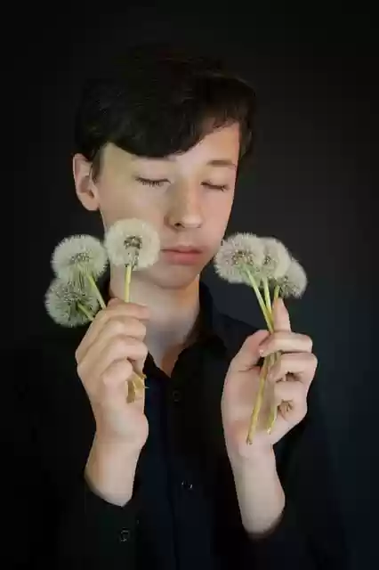 Free download young man boy teen hand flowers free picture to be edited with GIMP free online image editor