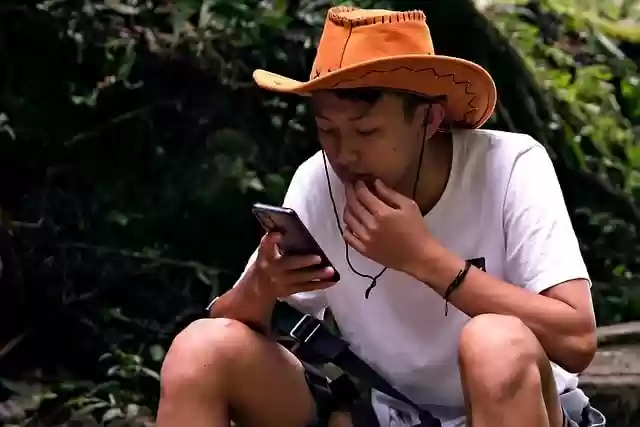Free download young man phone communication free picture to be edited with GIMP free online image editor